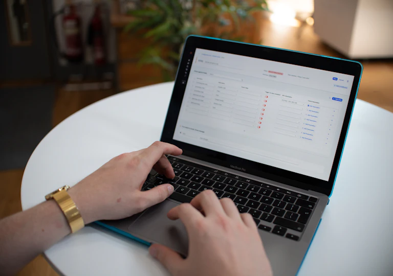 Managing patient CRM data and marketing automation on a laptop